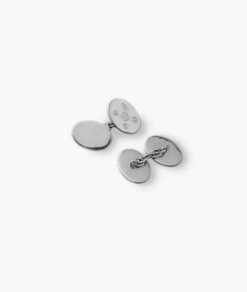 Oval plain cufflinks with engraved symbols